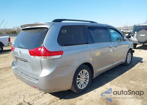 2014 Toyota Sienna Xle V6 8 Passenger z USA, uszkodzony, nr VIN 5TDYK3DC8ES490811
